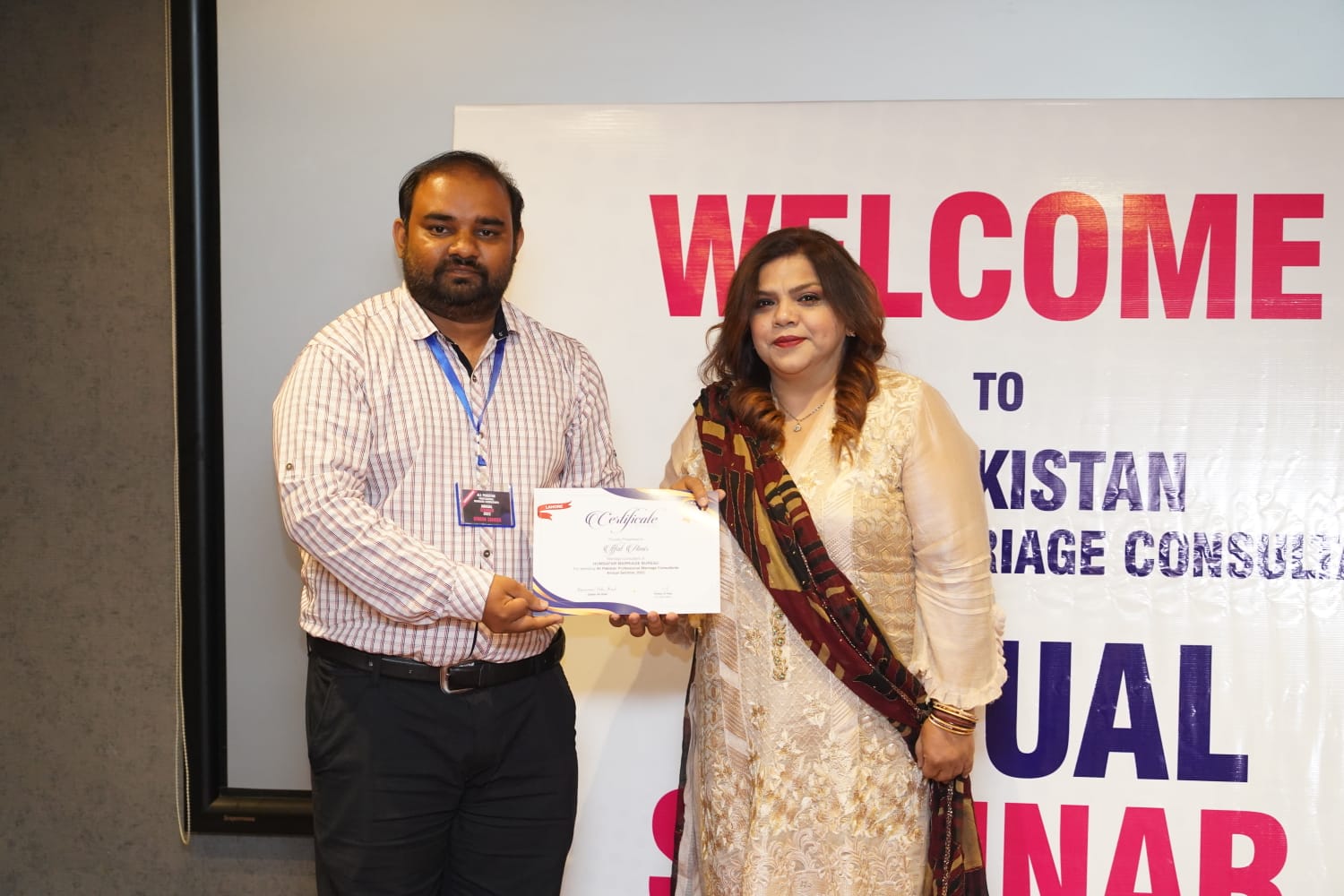 Certificate presentation at an industry seminar